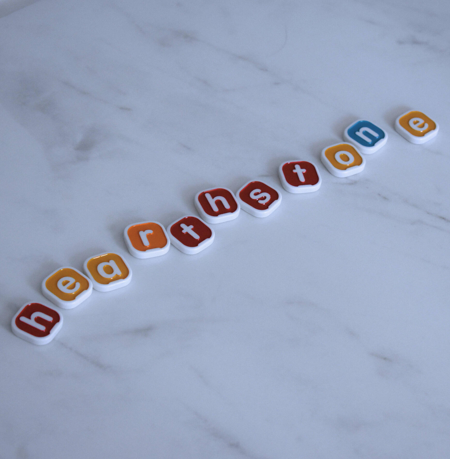 Hearthstone Letter Tiles Letter tiles used to spell out 'Hearthstone'